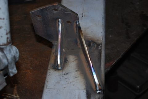 1996 Ford Bronco - Metal bracket with multiple mounting holes and fresh welds.