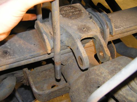 2000 Ford Excursion - Slide the u-bolts out from the top. They pull out quite easily.
