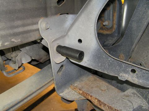 2000 Ford Excursion - There are three 13mm bolts holding the bracket in place. Using an impact wrench makes easy work of the bottom two.