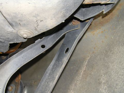 2000 Ford Excursion - The top 13mm bolt for the bumper corner support bracket is in a tight spot. You'll have to resort to a 3/8" ratchet to access this one. Too…