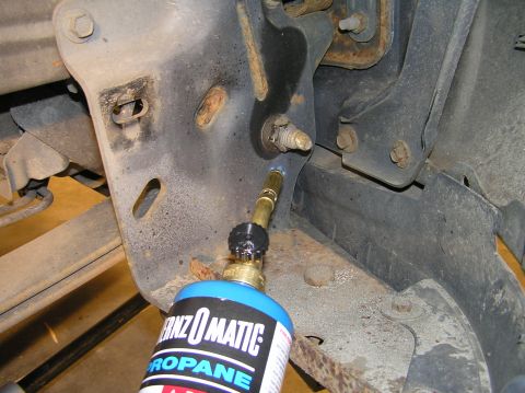 2000 Ford Excursion - Prepare to spend a lot of time on this step. As you can see, I pulled out the Bernz-O-Matic propane torch for the step and headed up the nu…