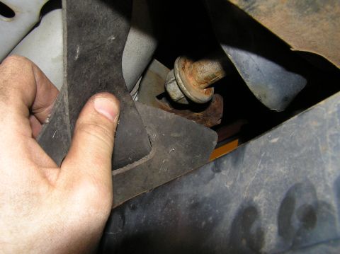 2000 Ford Excursion - This photo is actually from the driver's side -- but it applies to the passenger side leaf spring eye-bolt as well. This bolt runs into a s…
