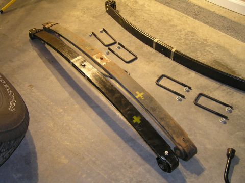 2000 Ford Excursion - New leaf spring (left) and old leaf spring (right).