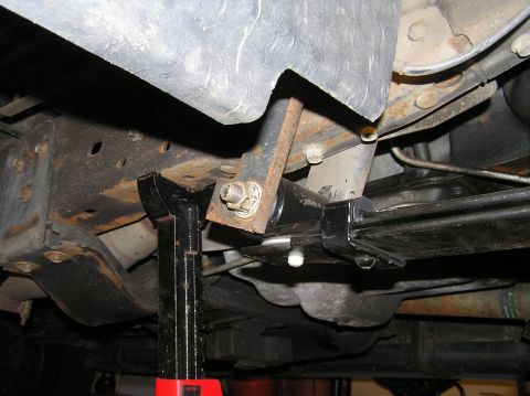 2000 Ford Excursion - Reinsert the rear bolt and tighten. Tools Needed: 24mm socket (nut) 21mm socket (bolt head) 1/2" ratchet or breaker bar 1/2" impact wrench