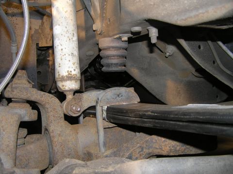 2000 Ford Excursion - The completed install! There's actually room for spring travel again. Conclusion This project was painfully drawn-out as I struggled with s…
