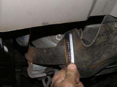 2000 Ford Excursion - Fortunately for us, this bracket is simple to remove with a 3/8" ratchet and an 8mm socket. It's somewhat hidden behind the rubber radiator…