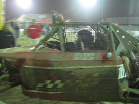 Close-up of a tube-frame off-road buggy cockpit with caged window