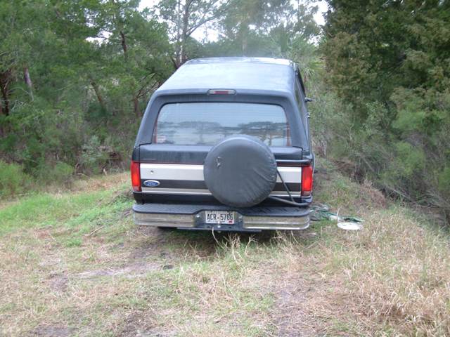 1987-1991 Ford Bronco rear with spare tire mounted and license plate ACR-5705