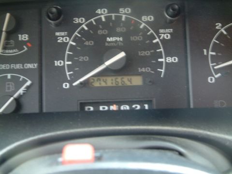 1992 Ford Bronco - Interior view of dashboard gauges, including the odometer showing 274,166.4 miles.