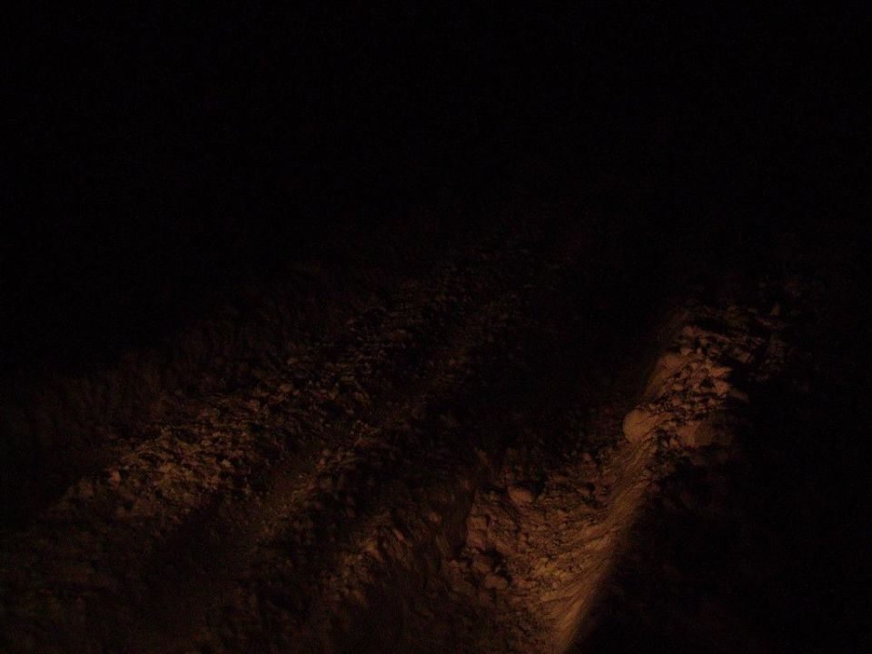 rocky ground illuminated by light
