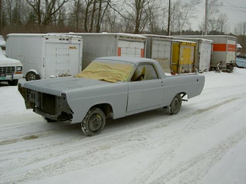 1967 Ford Ranchero - This 1967 Ford Ranchero is undergoing restoration and is parked outside in a snowy environment.