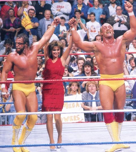 1991 Ford Bronco - Hulk Hogan and Randy Savage, the Mega Powers, celebrate a victory in the wrestling ring with Miss Elizabeth.
