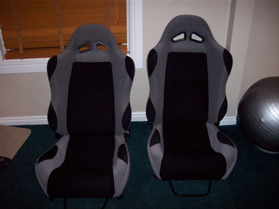 Pair of black and grey racing seats
