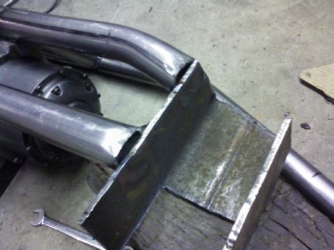 1995 Ford Bronco - Custom exhaust pipe fabrication in progress, showing welding and a differential.