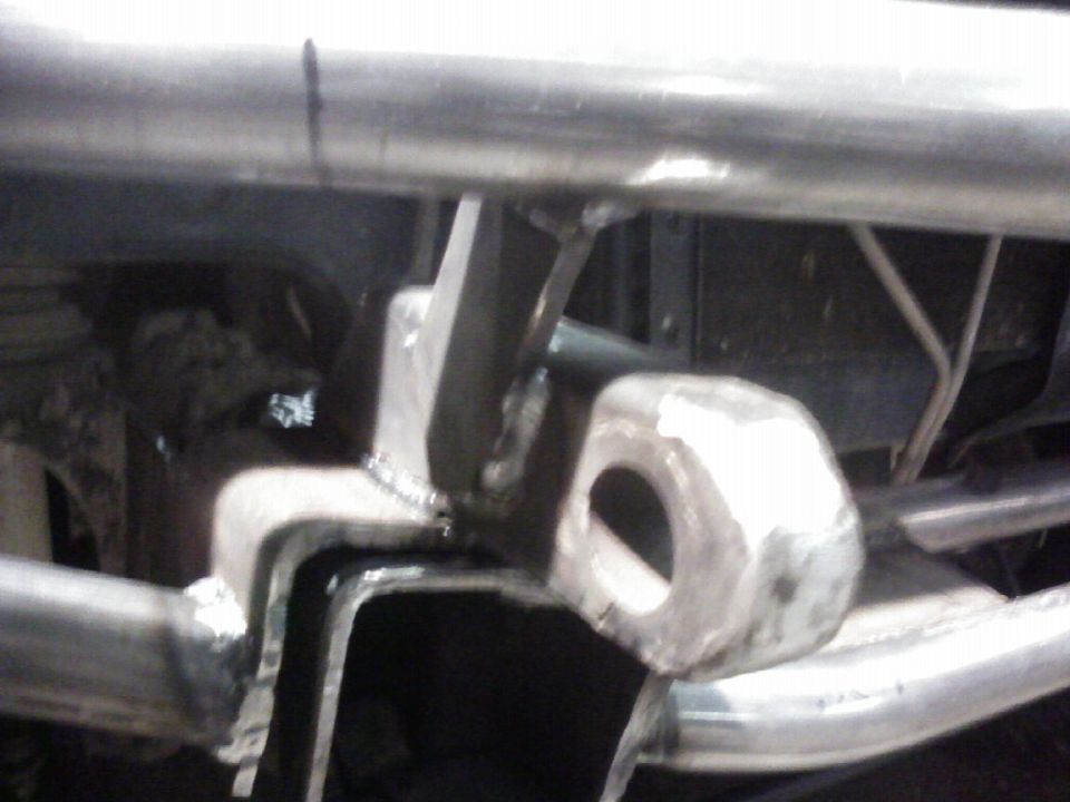 Close-up of a welded metal bracket, likely part of a custom bumper or frame modification