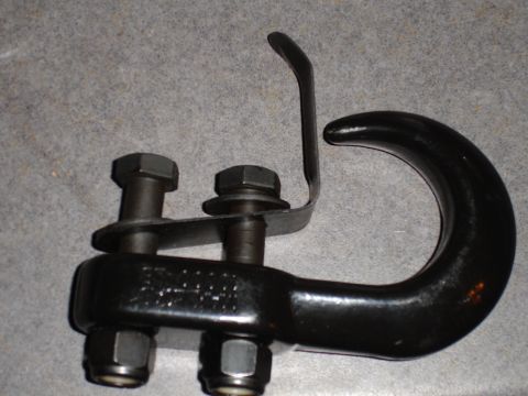 1989 Ford Bronco - Tow hook part with visible text and mounting hardware.