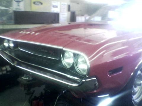 1988 Ford Bronco - Front view of a 1970 Dodge Challenger showing its distinctive grille and headlight design.