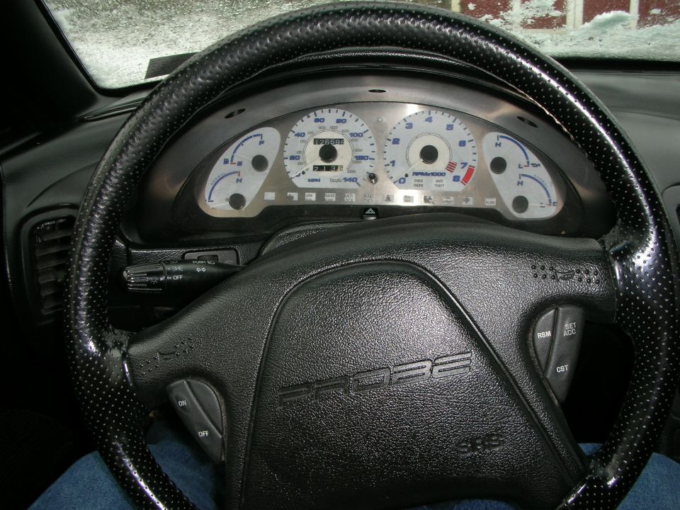 Ford Probe steering wheel and white-faced instrument cluster gauges