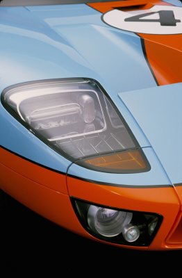 2003 Ford GT - Close-up of the headlight and front fender of a Ford GT40 in the iconic Gulf livery, the number 4 on the hood.
