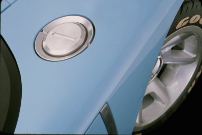2003 Ford GT - Close-up of the fuel filler door and wheel on a 2003 Ford GT.