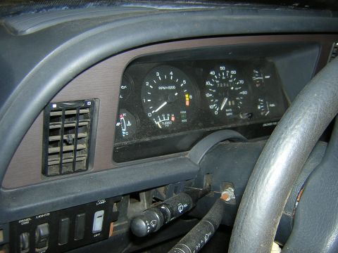 1987 Ford Thunderbird - The interior dashboard of a car, showing the instrument cluster and air vents. The odometer shows 72,351 miles.