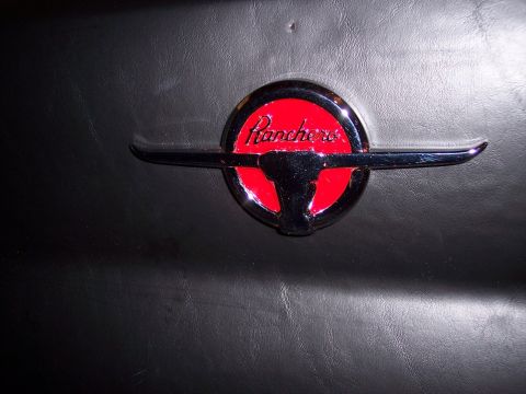1972 Ford Ranchero - Close-up of a Ranchero emblem, likely a vehicle badge.
