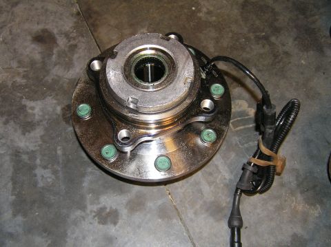 2000 Ford Excursion - Same hub assembly without the plastic plug.