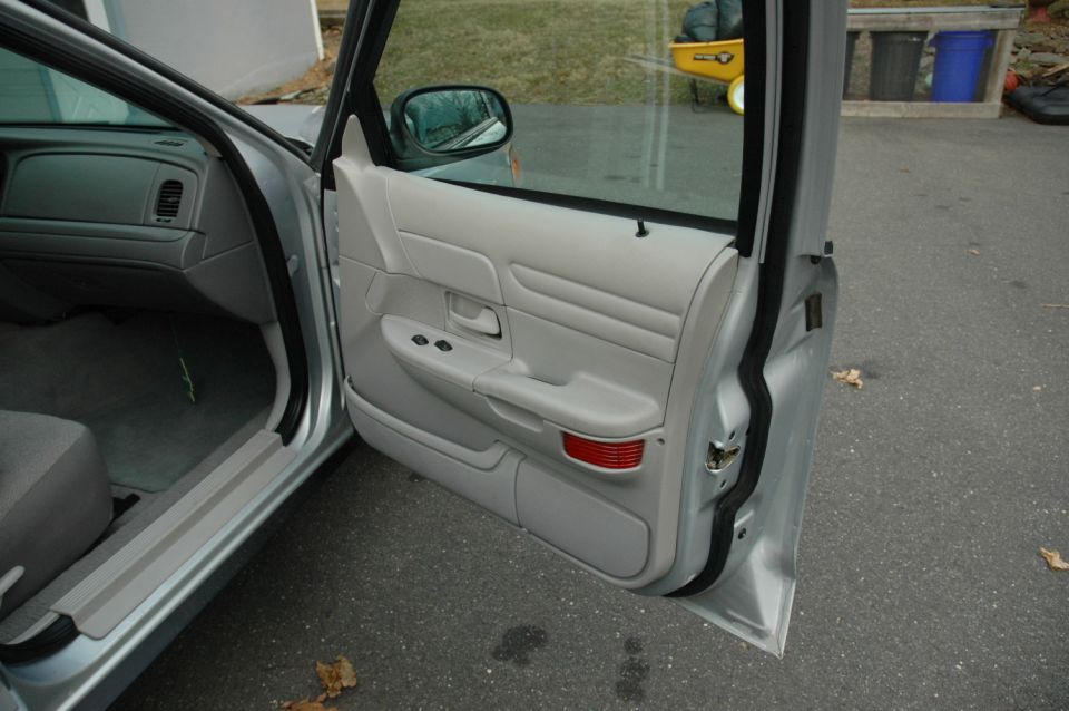 Interior door panel and dashboard of a 2003 Ford Crown Victoria