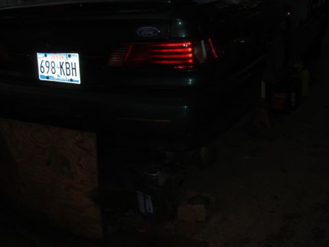 1993 Ford Taurus - Rear view of a 1993 Ford Taurus showing its taillights and license plate.