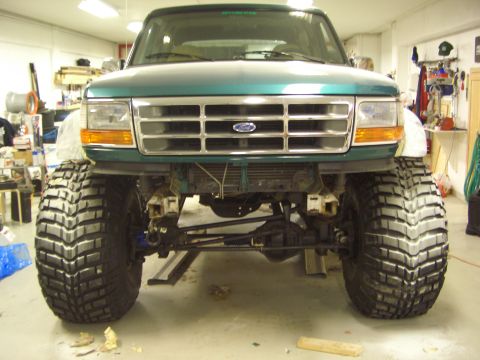 1996 Ford Bronco - Front view of a 1996 Ford Bronco modified with large off-road tires.