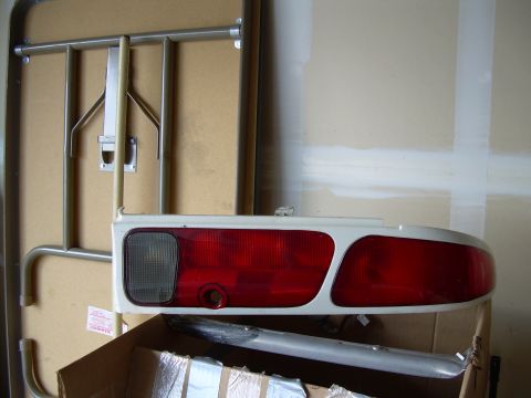 1996 Ford Probe - A detached taillight assembly is shown, likely for a vehicle part replacement.