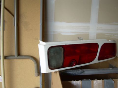 1996 Ford Probe - A white and red tail light assembly is shown, likely a replacement part.