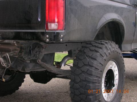 1996 Ford Bronco - Close-up view of the rear bumper and off-road tire on a black SUV, with a timestamp of January 21, 2007.