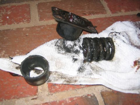 1979 Ford Bronco - Disassembled suspension components, likely from a vehicle rebuild project, resting on a towel.