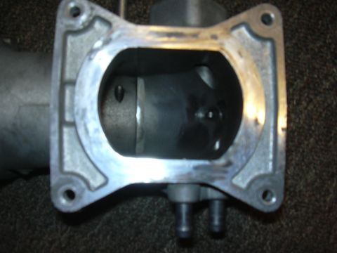 1996 Ford Crown Victoria - Throttle body intake opening, likely from a car's engine.