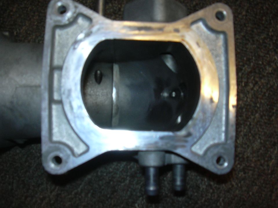 Close-up of a throttle body intake opening
