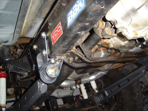 1986 Ford Bronco - Aftermarket suspension parts visible on the underbody of a vehicle, VDO Instruments and BBK branding.