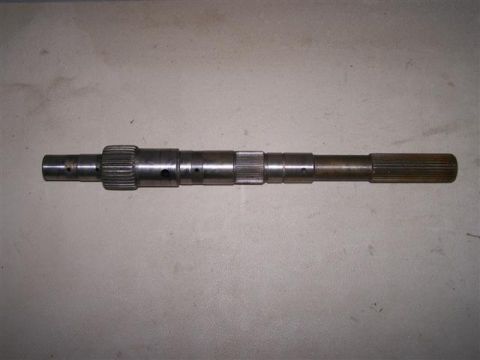 1995 Ford Bronco - A metal driveshaft is shown against a neutral background.