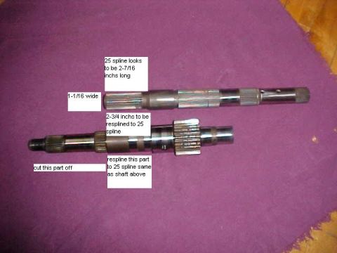 1995 Ford Bronco - Two metal shafts are shown with annotations indicating measurements and spline counts.
