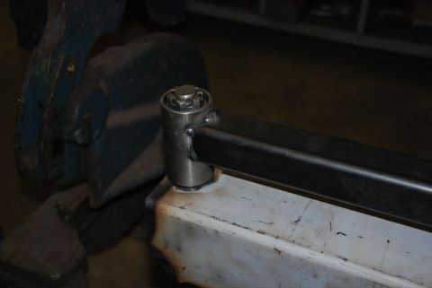 1996 Ford Bronco - Close-up of a metal component, possibly part of a custom build or repair, a nut and bolt assembly.