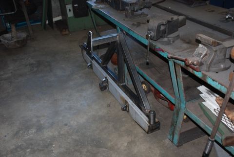 1996 Ford Bronco - A custom rear bumper is being fabricated with welded steel components and mounting hardware.
