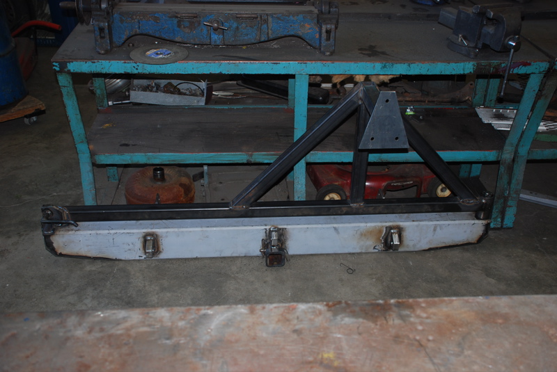 Custom rear bumper with tire carrier mount