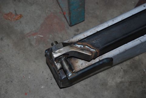 1996 Ford Bronco - Custom metal bracket fabricated with welding and bolted assembly.