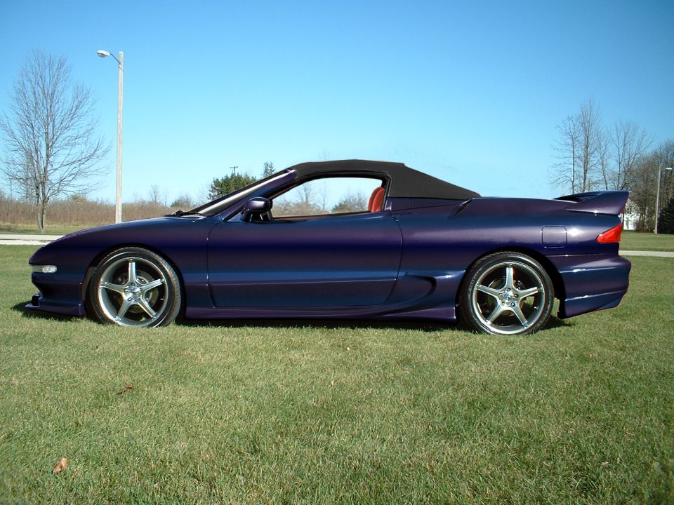 1995 Ford Probe convertible, side view, purple paint, black top