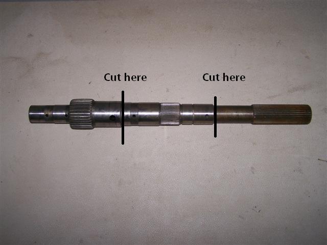 Metal shaft with two black lines indicating cuts and text 'Cut here' above them