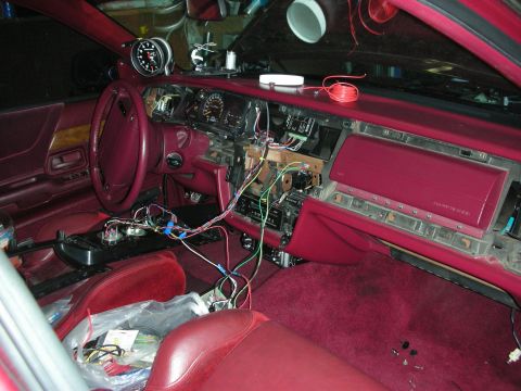 1992 Ford Crown Victoria - The interior of a 1992 Ford Crown Victoria shows exposed wiring and removed dashboard components.