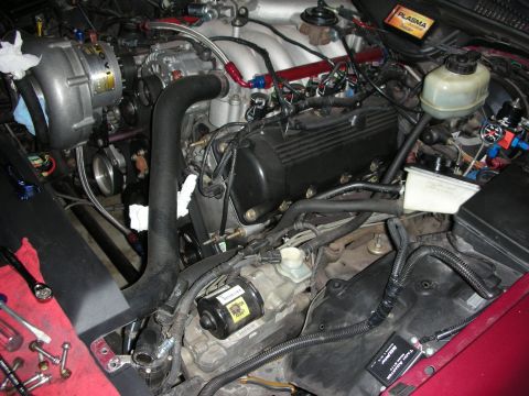 1992 Ford Crown Victoria - Engine bay modifications are visible, including a supercharger and custom fuel lines.