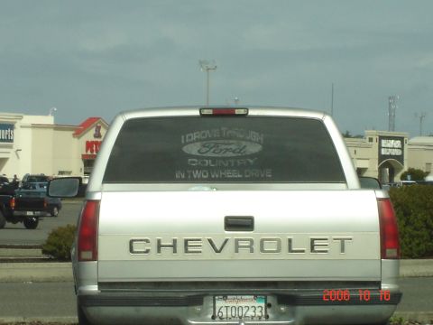 1993 Ford Bronco - This Chevrolet pickup truck displays a decal referencing Ford trucks and two-wheel drive capability.