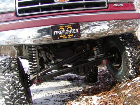 1991 Ford Bronco - This modified Ford truck features a custom suspension system and a "Firefighter 22" license plate.