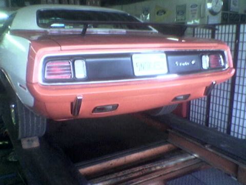 1988 Ford Bronco - This muscle car's rear end is visible, showing its taillights and a license plate.